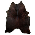 Brown cowhide rug of about 200 × 160 cm, seen from above: the exact hide you receive