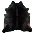 Brown cowhide rug of about 230 × 210 cm, seen from above: the exact hide you receive