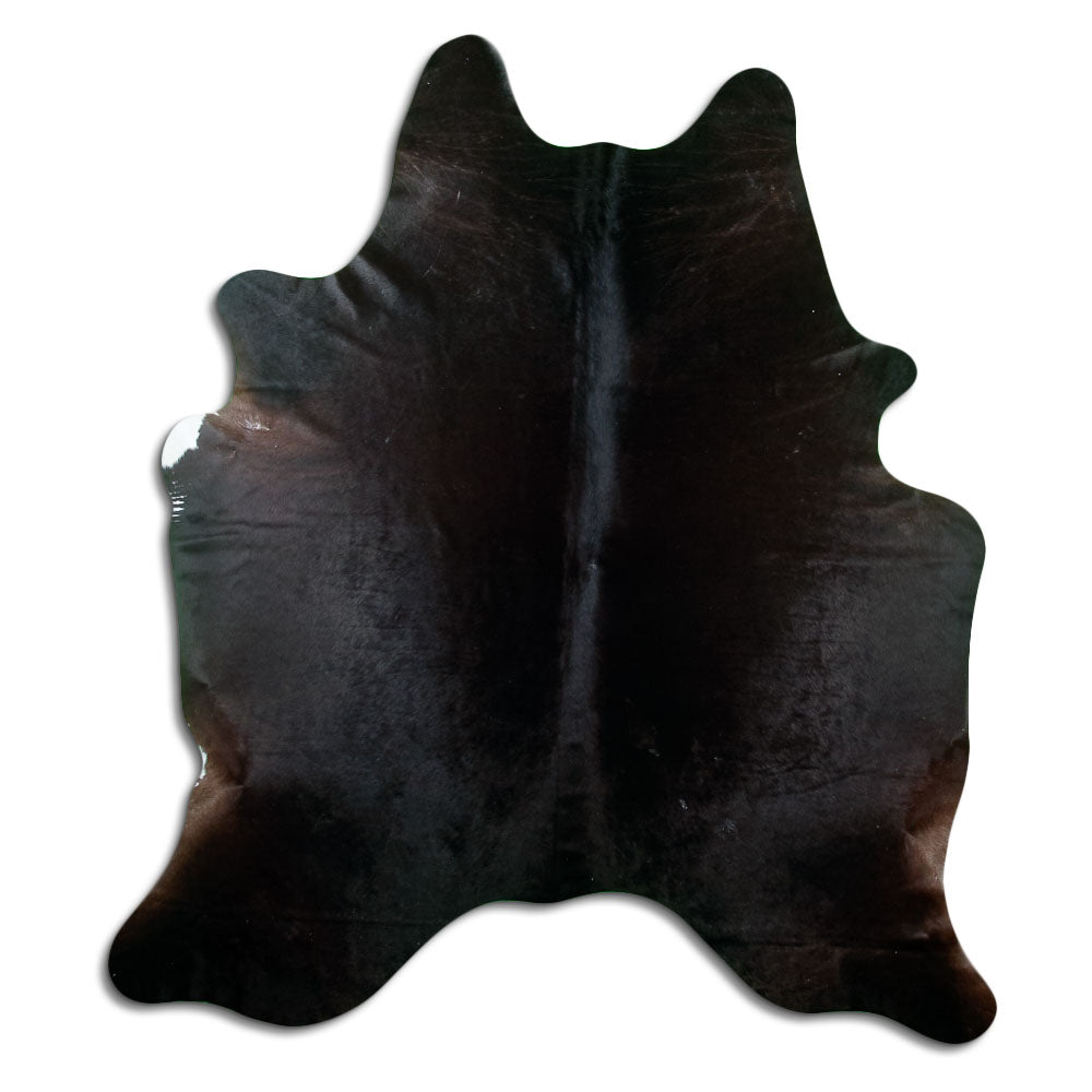 Brown cowhide rug of about 220 × 200 cm, seen from above: the exact hide you receive