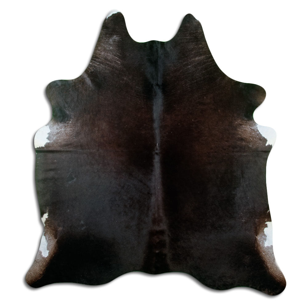 Brown cowhide rug of about 210 × 190 cm, seen from above: the exact hide you receive