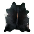 Brown cowhide rug of about 210 × 180 cm, seen from above: the exact hide you receive