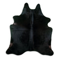 Brown cowhide rug of about 200 × 190 cm, seen from above: the exact hide you receive