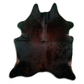 Brown cowhide rug of about 200 × 180 cm, seen from above: the exact hide you receive