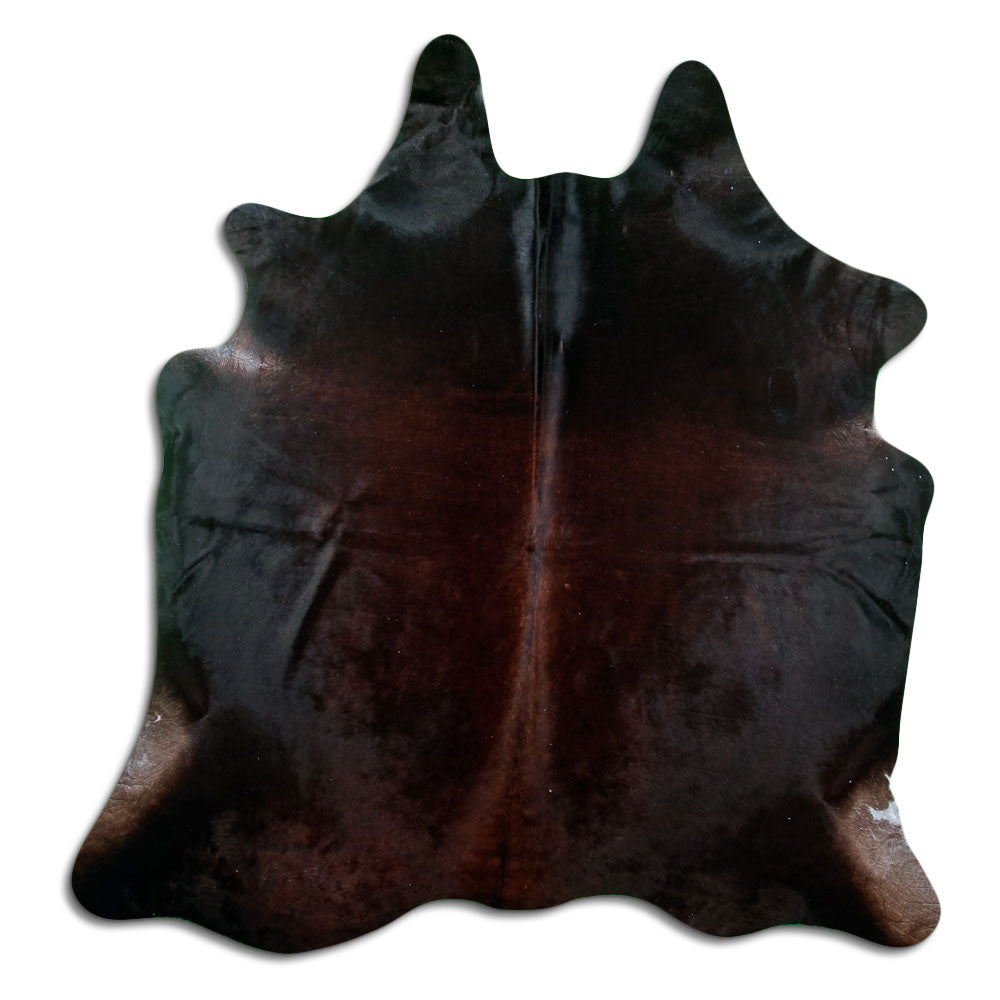 Brown cowhide rug of about 210 × 200 cm, seen from above: the exact hide you receive