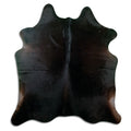 Brown cowhide rug of about 200 × 180 cm, seen from above: the exact hide you receive