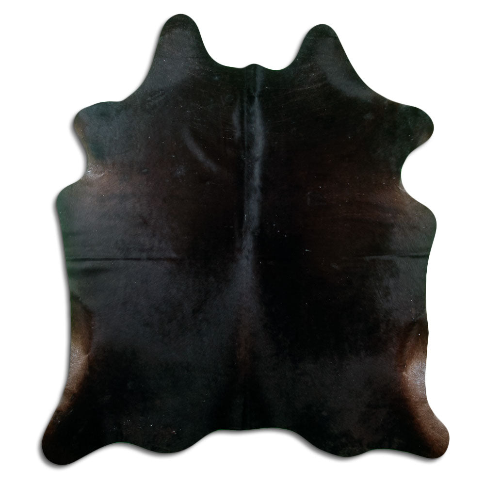 Brown cowhide rug of about 200 × 180 cm, seen from above: the exact hide you receive
