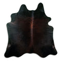 Brown cowhide rug of about 200 × 190 cm, seen from above: the exact hide you receive