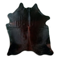Brown cowhide rug of about 200 × 170 cm, seen from above: the exact hide you receive