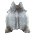Grey cowhide rug of about 200 × 160 cm, seen from above: the exact hide you receive