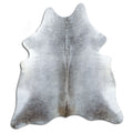 Grey cowhide rug of about 190 × 170 cm, seen from above: the exact hide you receive