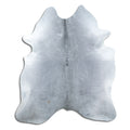 Grey cowhide rug of about 220 × 190 cm, seen from above: the exact hide you receive