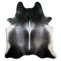 Grey cowhide rug of about 220 × 200 cm, seen from above: the exact hide you receive