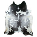 Grey cowhide rug of about 220 × 180 cm, seen from above: the exact hide you receive