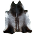 Grey cowhide rug of about 220 × 200 cm, seen from above: the exact hide you receive