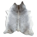 Grey cowhide rug of about 210 × 200 cm, seen from above: the exact hide you receive