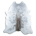 Grey cowhide rug of about 210 × 190 cm, seen from above: the exact hide you receive