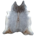 Grey cowhide rug of about 220 × 210 cm, seen from above: the exact hide you receive