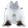 Grey cowhide rug of about 230 × 210 cm, seen from above: the exact hide you receive