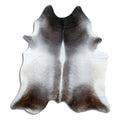 Grey cowhide rug of about 230 × 210 cm, seen from above: the exact hide you receive