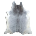 Grey cowhide rug of about 210 × 180 cm, seen from above: the exact hide you receive