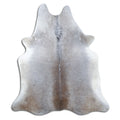 Grey cowhide rug of about 220 × 190 cm, seen from above: the exact hide you receive