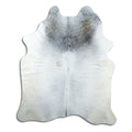 Grey cowhide rug of about 220 × 180 cm, seen from above: the exact hide you receive