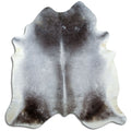 Grey cowhide rug of about 220 × 220 cm, seen from above: the exact hide you receive