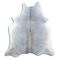 Grey cowhide rug of about 200 × 190 cm, seen from above: the exact hide you receive
