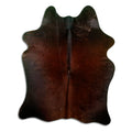 Brown cowhide rug of about 170 × 130 cm, seen from above: the exact hide you receive
