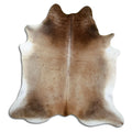 Brown cowhide rug of about 210 × 200 cm, seen from above: the exact hide you receive