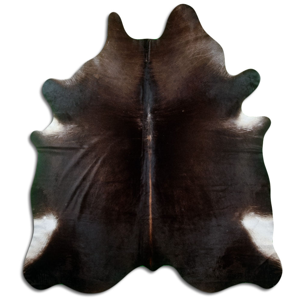 Brown cowhide rug of about 240 × 210 cm, seen from above: the exact hide you receive