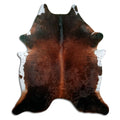 Brown cowhide rug of about 200 × 180 cm, seen from above: the exact hide you receive