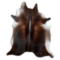 Brown cowhide rug of about 230 × 200 cm, seen from above: the exact hide you receive