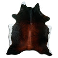 Brown cowhide rug of about 210 × 180 cm, seen from above: the exact hide you receive