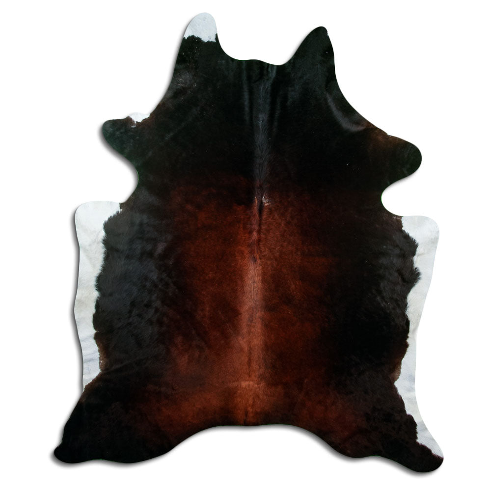 Brown cowhide rug of about 210 × 180 cm, seen from above: the exact hide you receive