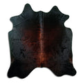 Brown cowhide rug of about 200 × 190 cm, seen from above: the exact hide you receive