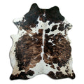 Tricolour cowhide rug of about 200 × 180 cm, seen from above: the exact hide you receive