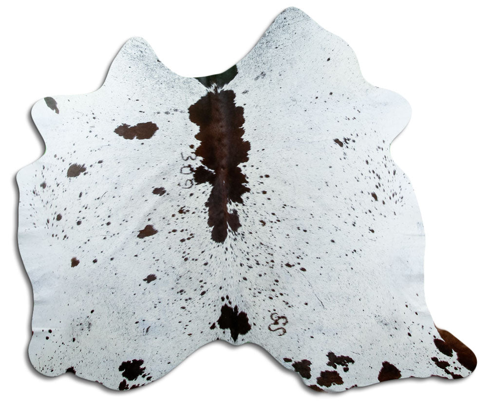 Tricolour cowhide rug of about 160 × 190 cm, seen from above: the exact hide you receive