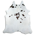 Tricolour cowhide rug of about 210 × 180 cm, seen from above: the exact hide you receive