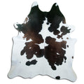 Tricolour cowhide rug of about 220 × 190 cm, seen from above: the exact hide you receive