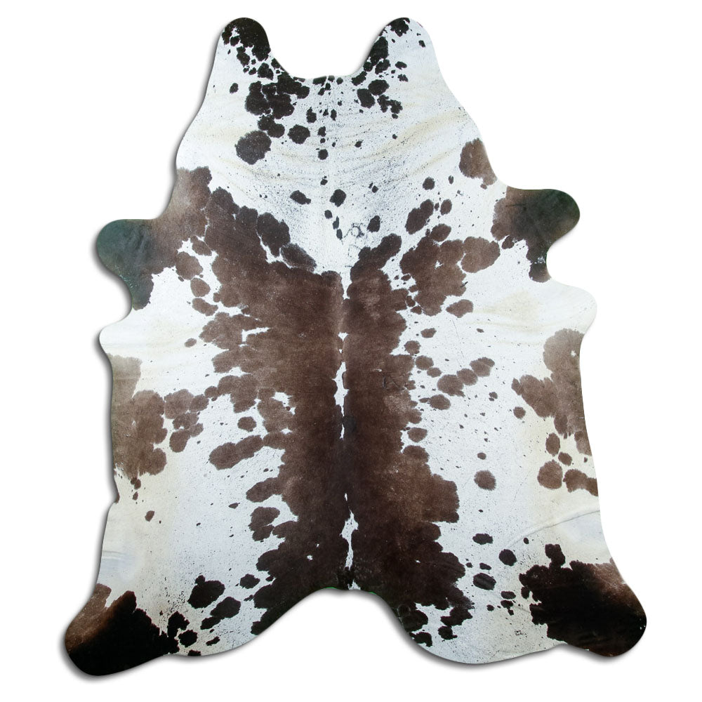 Tricolour cowhide rug of about 240 × 210 cm, seen from above: the exact hide you receive