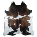 Tricolour cowhide rug of about 230 × 210 cm, seen from above: the exact hide you receive