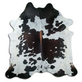 Tricolour cowhide rug of about 220 × 210 cm, seen from above: the exact hide you receive