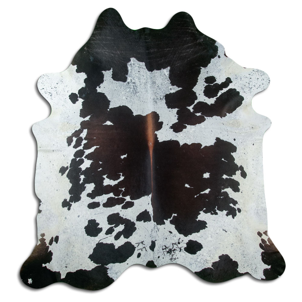 Tricolour cowhide rug of about 220 × 210 cm, seen from above: the exact hide you receive