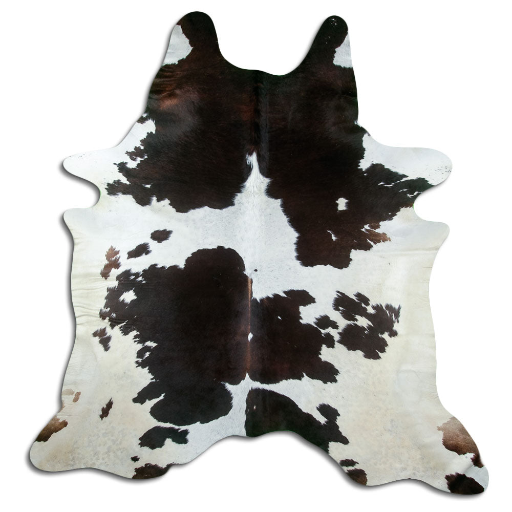 Tricolour cowhide rug of about 230 × 220 cm, seen from above: the exact hide you receive