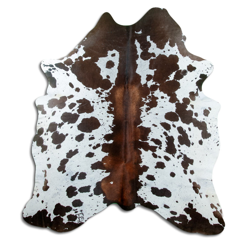 Tricolour cowhide rug of about 190 × 170 cm, seen from above: the exact hide you receive