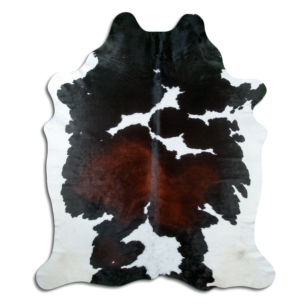 Tricolour cowhide rug of about 220 × 190 cm, seen from above: the exact hide you receive