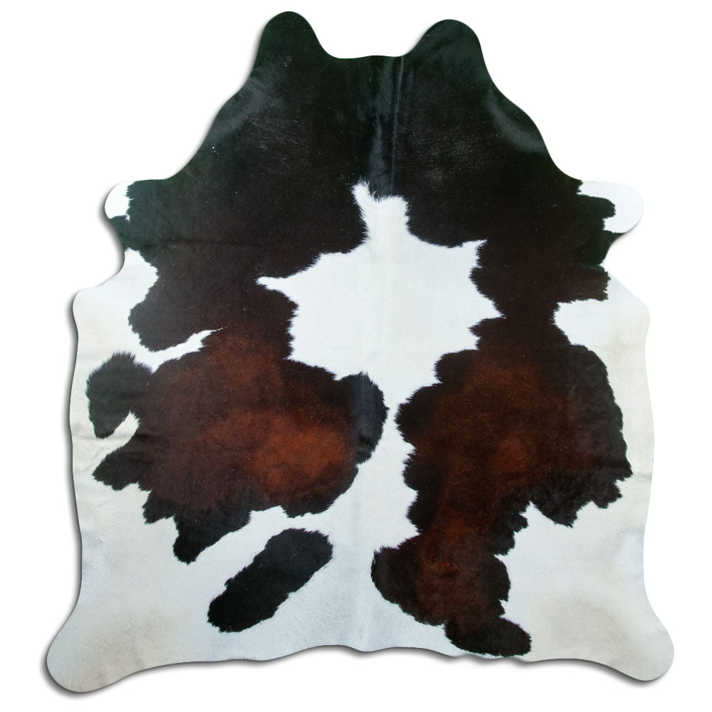 Tricolour cowhide rug of about 210 × 190 cm, seen from above: the exact hide you receive