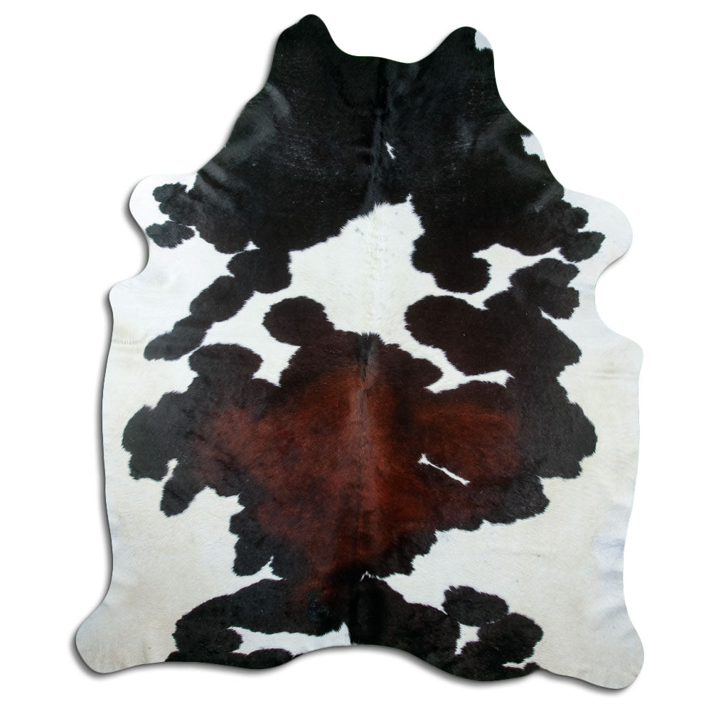 Tricolour cowhide rug of about 240 × 210 cm, seen from above: the exact hide you receive