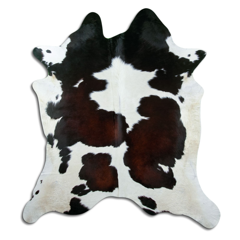 Tricolour cowhide rug of about 220 × 200 cm, seen from above: the exact hide you receive